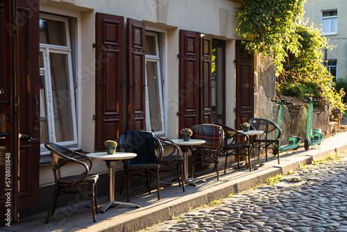 Vilnius old town street with paving stones in sunset photo