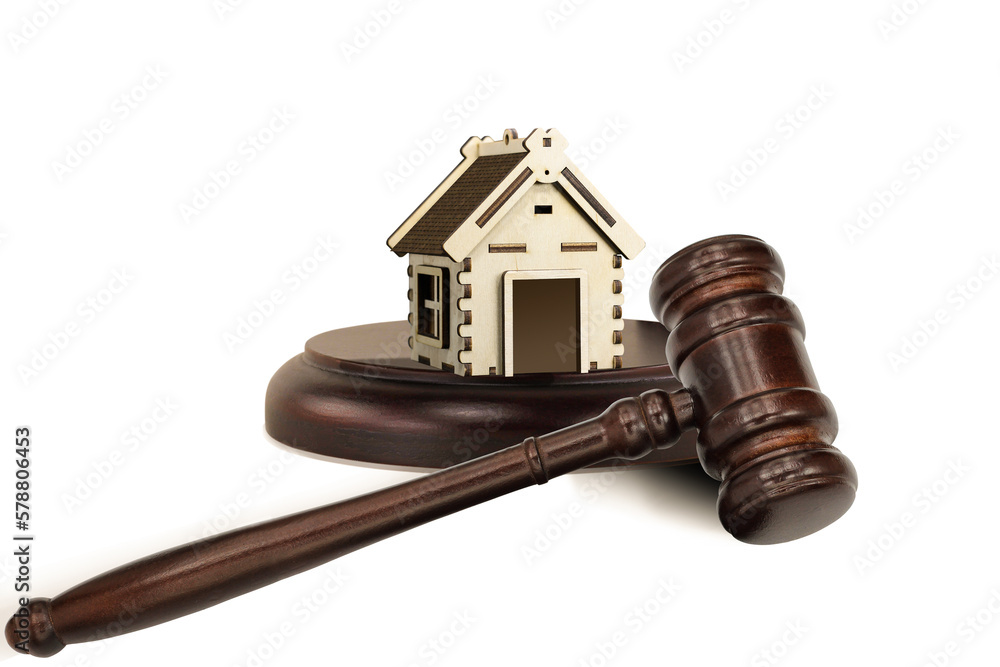 Abstract photo with wooden gavel and abstract house isolated on white background