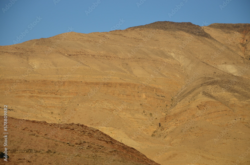 Panoramic view of the rocks, canyons and the desert and dry landscape surrounding Madaba, Jordan, on a bright sunny day. Panoramic view of the rocks, canyons and the desert and dry landscape surrounding Madaba, Jordan, on a bright sunny day.
