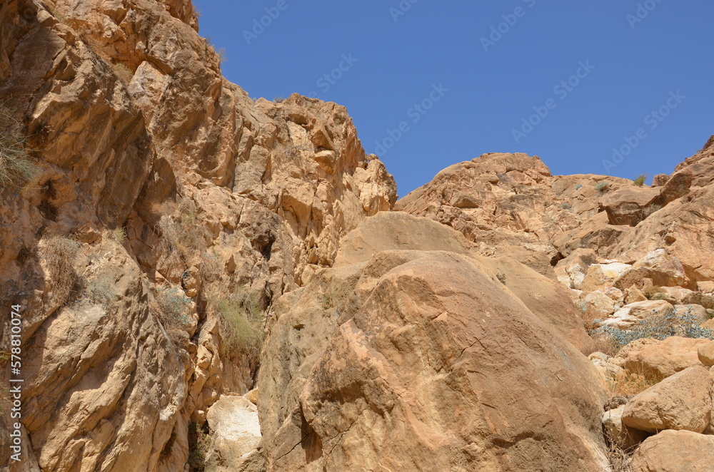 Panoramic view of the rocks, canyons and the desert and dry landscape surrounding Madaba, Jordan, on a bright sunny day. Panoramic view of the rocks, canyons and the desert and dry landscape surrounding Madaba, Jordan, on a bright sunny day.