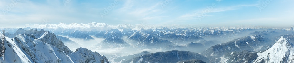 Winter hazy view from Dachstein mountain massif top to Schladming and Filzmoos region (Austria).