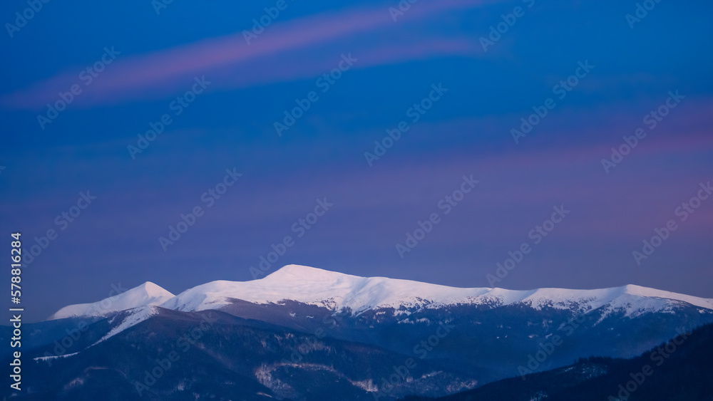Beautiful Carpathian Mountains. Winter Night over Hoverla Mountain, Ukraine.