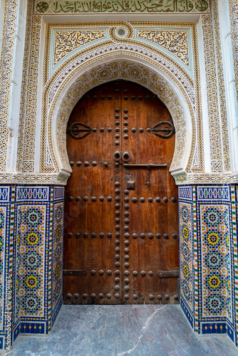 Old Moroccan wooden door in the medina of Fez, Morocco