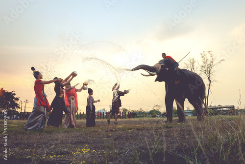 Photography Elephants and tourism splashing water flighting on Sonkran festival in Ayutthaya