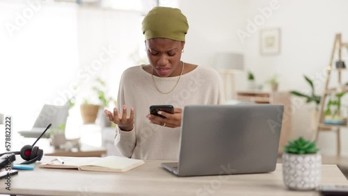 Confused, phone and message with black woman in office for problem, frustrated and 404 error. Bad news, connection and angry with employee browsing online at desk for issue, networking and dilemma photo