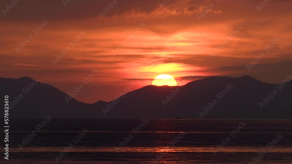 Time lapse shot of sunset seascape. View from Klong Muang Beach, Krabi Province, Thailand. Time lapse shot of sunset seascape. View from Klong Muang Beach, Krabi Province, Thailand.