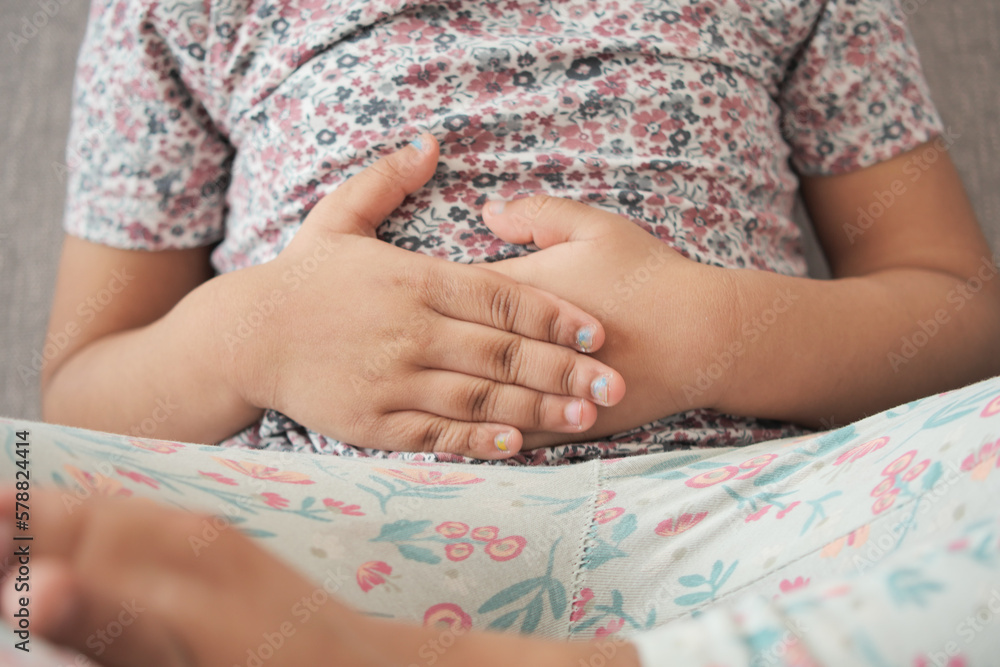 child suffering stomach pain close up. child suffering stomach pain close up.