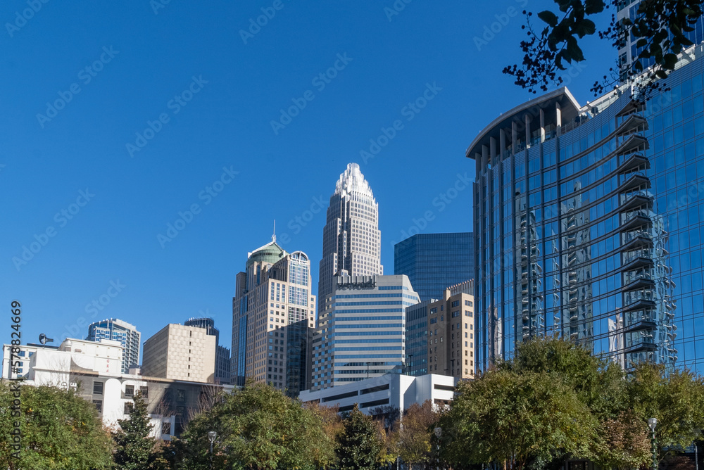 Charlotte, Carolina del Norte, Usa. November 23, 2022: City center with blue sky and modern building architecture. Charlotte, Carolina del Norte, Usa. November 23, 2022: City center with blue sky and modern building architecture.
