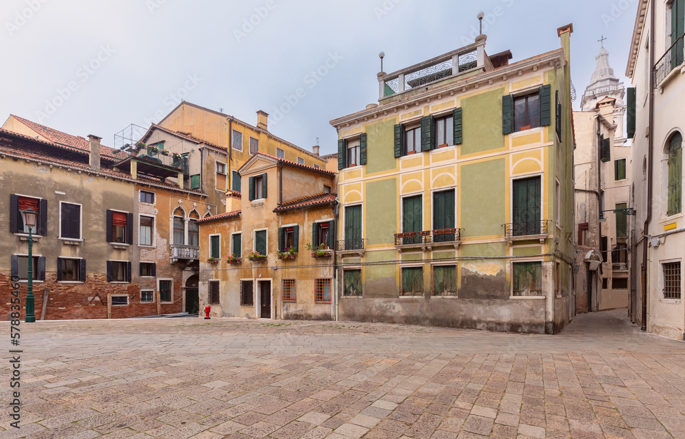 Old beautiful houses in a traditional small square in Venice.