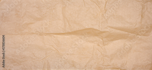 Crumpled brown parchment paper, close up