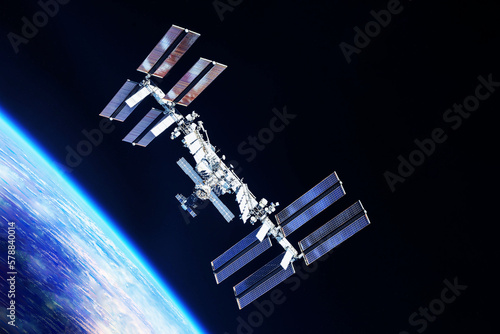 Fototapeta Naklejka Na Ścianę i Meble -  International Space Station above the Earth. Elements of this image furnished by NASA