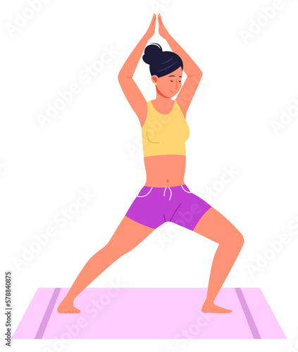 Woman yoga training. Person in balance pose stretching on mat