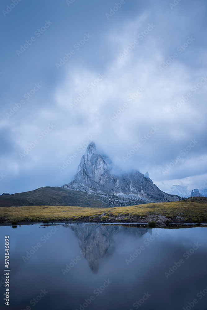 Mount Ra Gusela reflecting in a pond in Passo Giau, Cortina d'Ampezzo, Italy