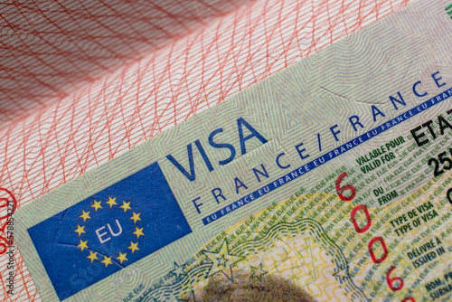 Fotografie French visa stamp in a travel passport, France Schengen visa, immigrant, work an