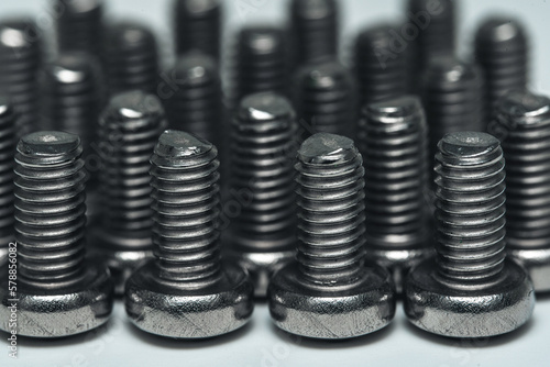 Close Up of Small Screws in Rows