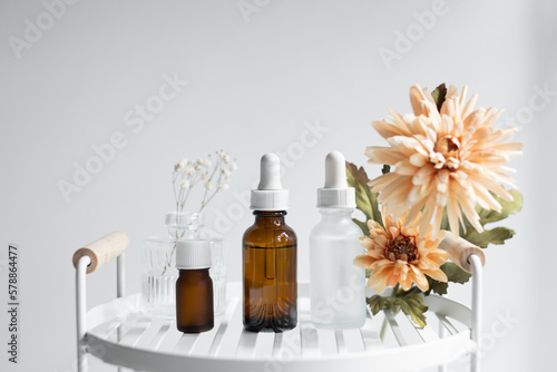 The natural skincare bottle with flowers.