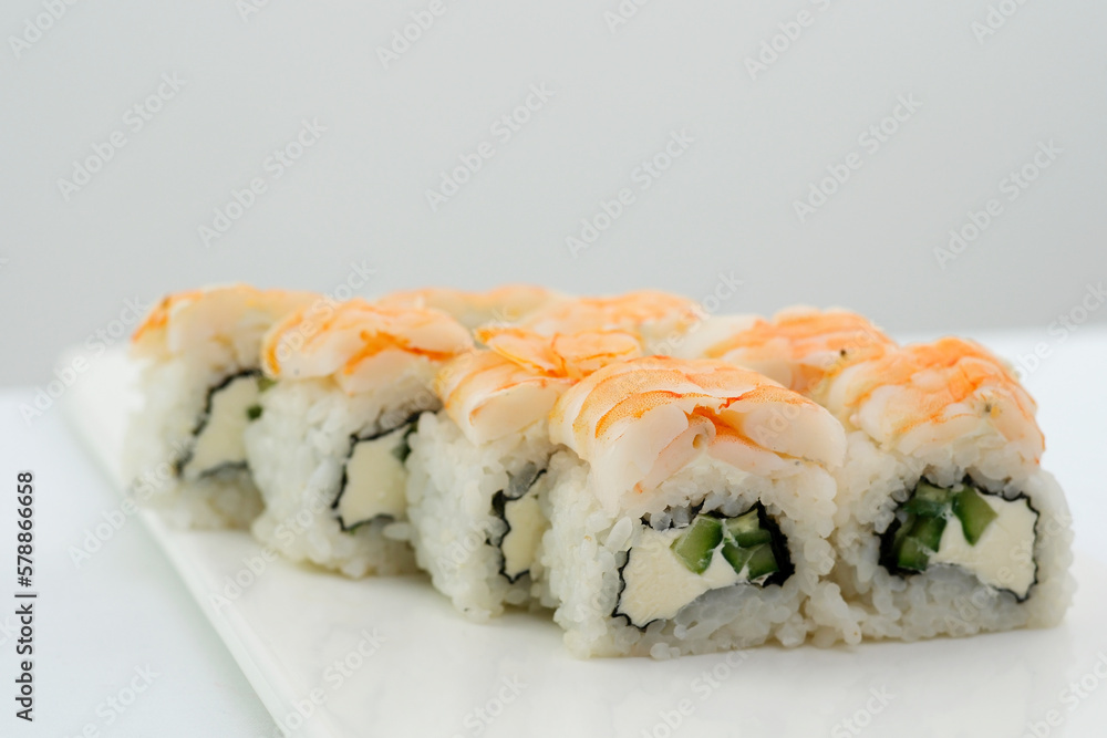 Shrimp sushi, red fish, tuna, large Japanese rolls, chopsticks. sushi with shrimp High quality photo Shrimp sushi, red fish, tuna, large Japanese rolls, chopsticks. sushi with shrimp High quality photo