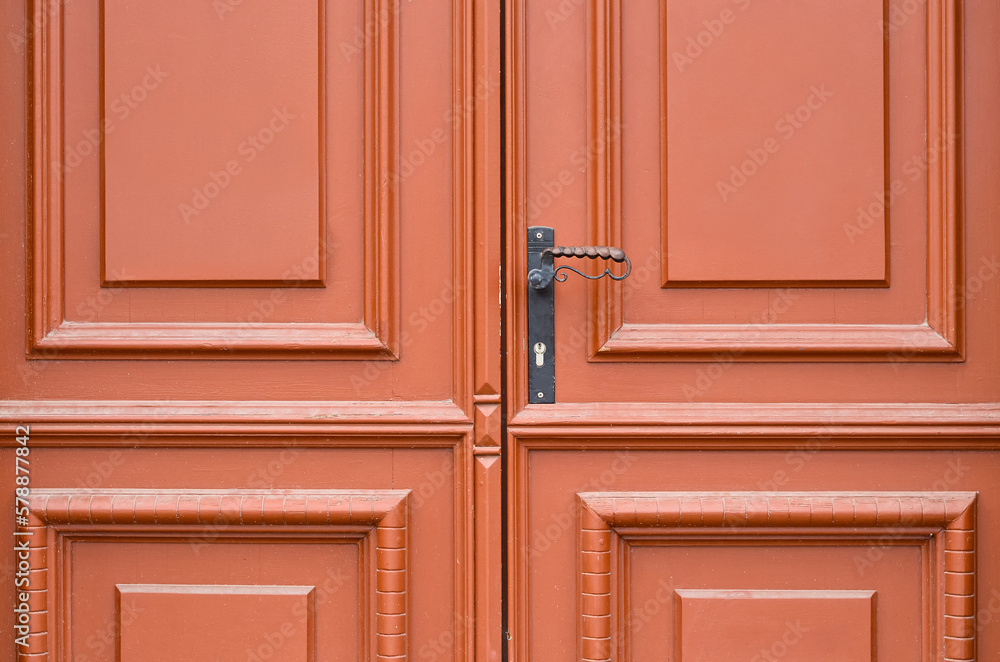Fototapeta premium View of wooden door in city, closeup