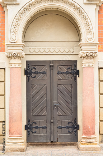 View of old building with wooden door