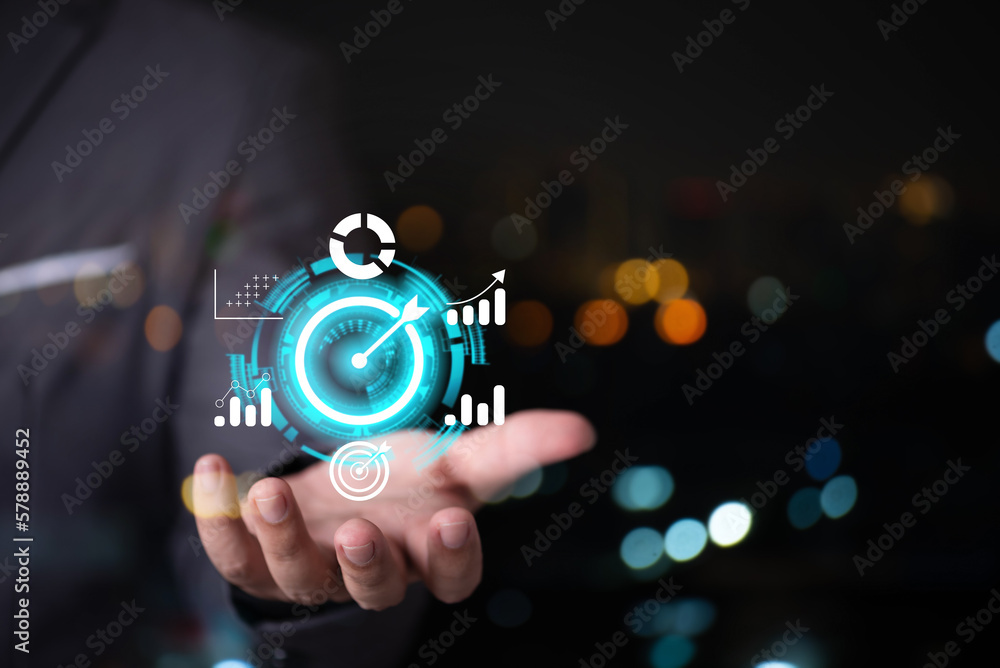 man hand holding virtual target business graph icon on screen , business target point man hand holding virtual target business graph icon on screen , business target point