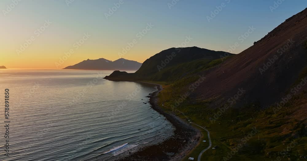 Nightless night on the coast of Russelv. in Lyngen alps, Norway - Aerial view Nightless night on the coast of Russelv. in Lyngen alps, Norway - Aerial view