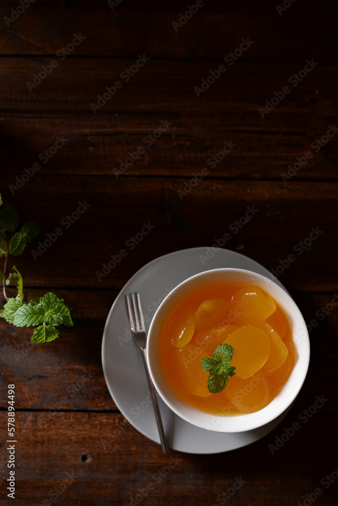 sweet yellow kolang kaling jelly in a ceramic bowl sweet yellow kolang kaling jelly in a ceramic bowl
