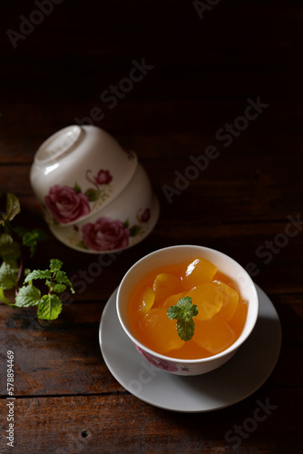 sweet yellow kolang kaling jelly in a ceramic bowl photo