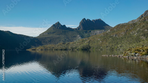 close view of cradle mountain and its reflection on dove lake in tasmania