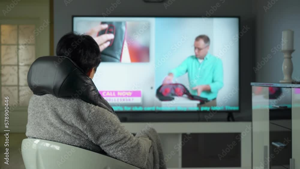A middle-aged housewife shopping in a TV shop. A professional salesperson convinces a customer to buy a new, unique electric massager. Network advertising, TV shop, telemarketing, online sales. A middle-aged housewife shopping in a TV shop. A professional salesperson convinces a customer to buy a new, unique electric massager. Network advertising, TV shop, telemarketing, online sales.