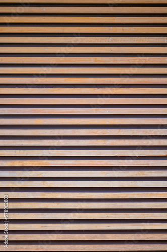 Blonde Scandinavian Birchwood Planking on a Black Wall.