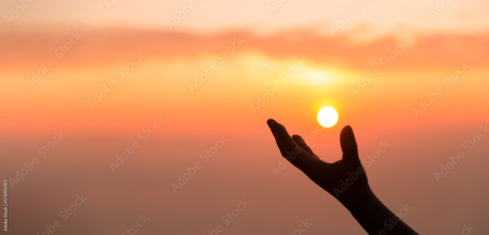 Silhouette of woman hand praying spirituality and religion, banner and copy space of female worship to god. Christianity religion concept. Christians person are pray humility humble to god.