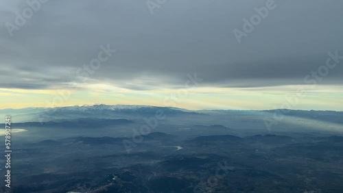 Stunning aerial view of Mulhacen peak, in Sierra Nevada, Granada, Spainn. Sunrise with the view of majestic peaks and hazy valleys. Pilot point of view. photo