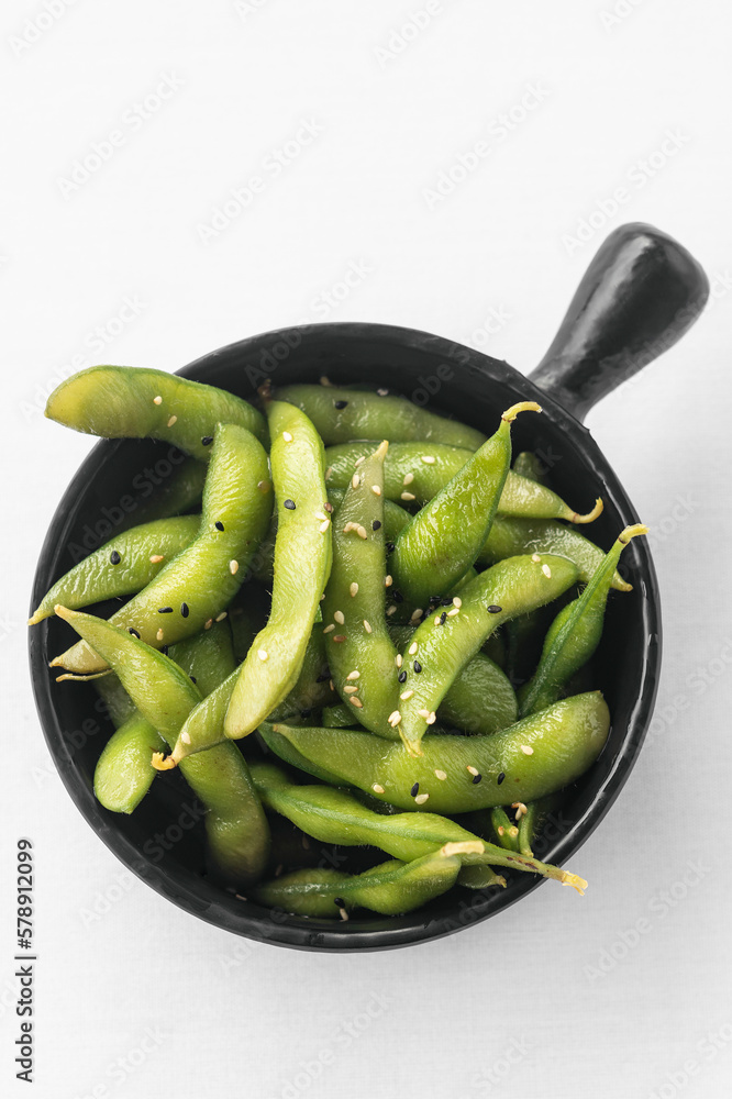 portion of edamame green beans in bowl portion of edamame green beans in bowl