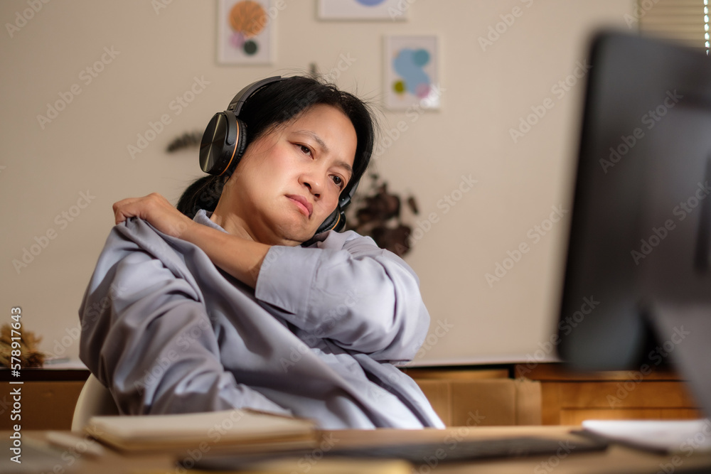 asian woman shoulder ache office syndrome when working long time at home asian woman shoulder ache office syndrome when working long time at home