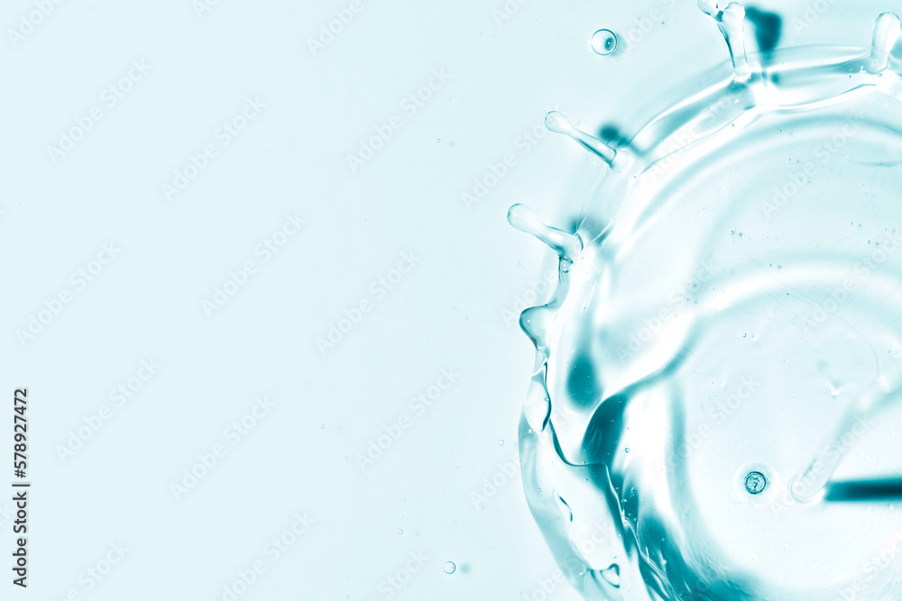Close-up of fresh and transparent splashes of water or lotion, micellar in the form of a crown Close-up of fresh and transparent splashes of water or lotion, micellar in the form of a crown