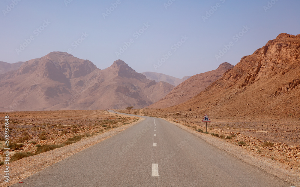 Road trip in Morocco- road in desertic landscape