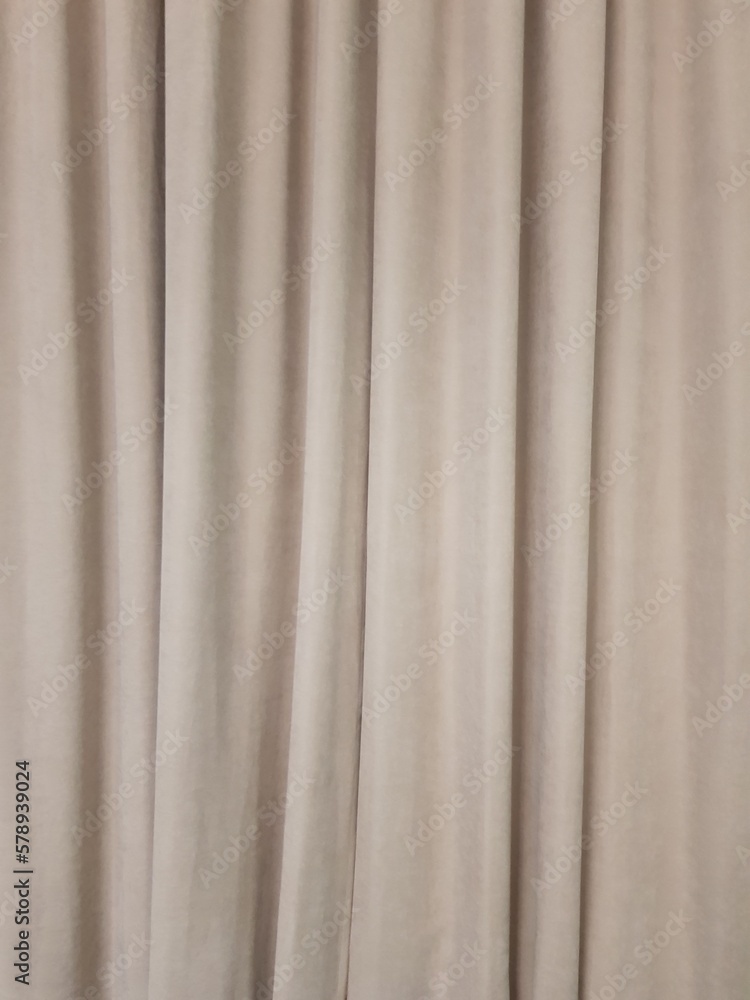 Beige abstract curtains, fabric background Beige abstract curtains, fabric background