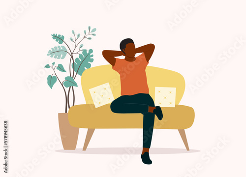 One Young Black Man With Hands Behind His Head Sitting On Couch And Relaxing At Home. Full Length. Flat Design Style, Character, Cartoon.