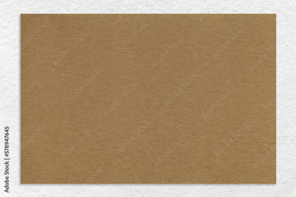 Texture of craft brown color paper background with white border, macro
