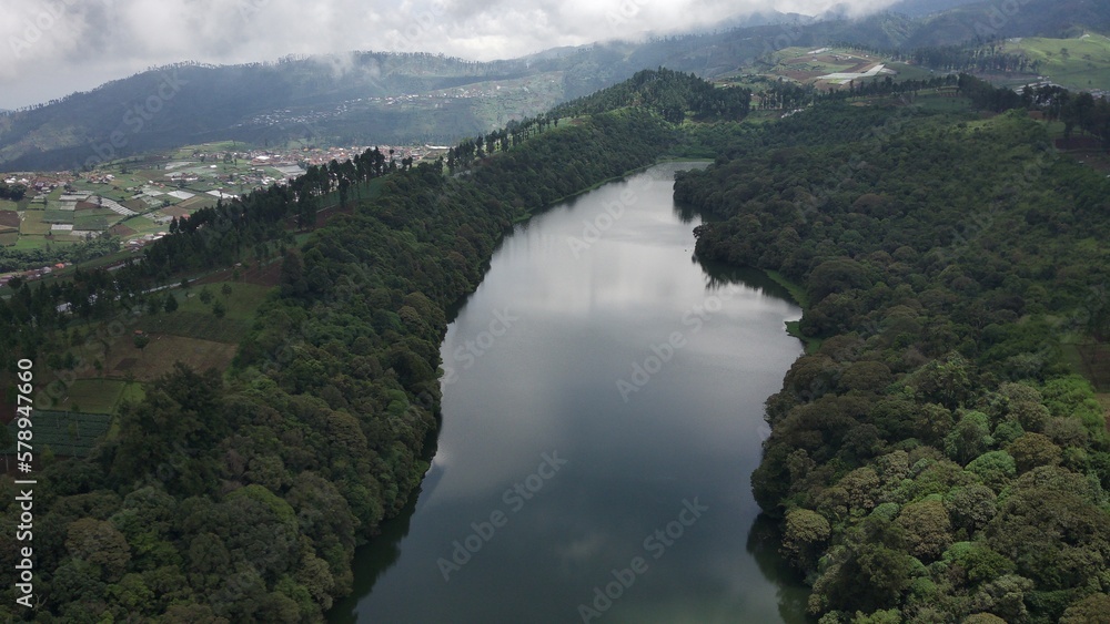 Aerial imagery of the Ranjeng lake which can hypnotize every visitor and the footage is taken using a drone which is located in a hidden village above the clouds in Indonesia