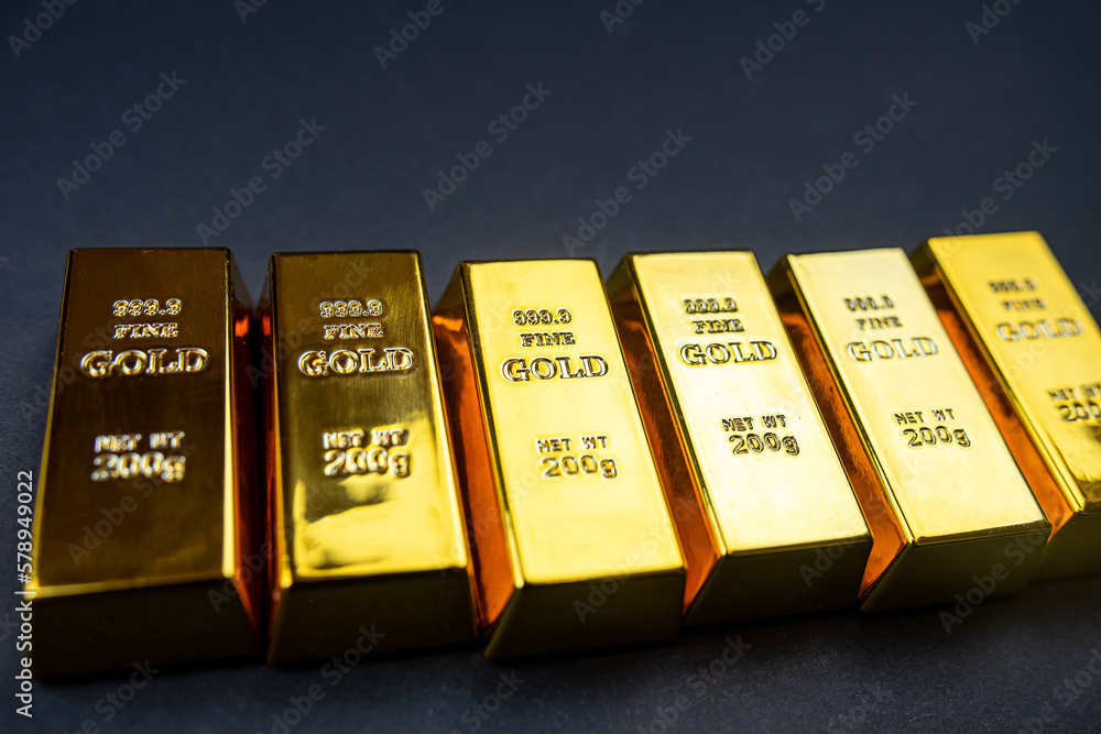 Stack of golden bars isolated on black background Stack of golden bars isolated on black background
