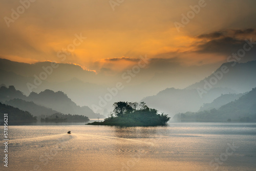 Fototapeta Naklejka Na Ścianę i Meble -  See the romantic and peaceful sunset in Thuong Lam, Tuyen Quang province, Vietnam