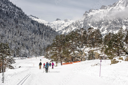 Skiers cross-country skiing in the Hautes-Pyrennees in the ski resort of Cauterets and Pont-d'Espagne