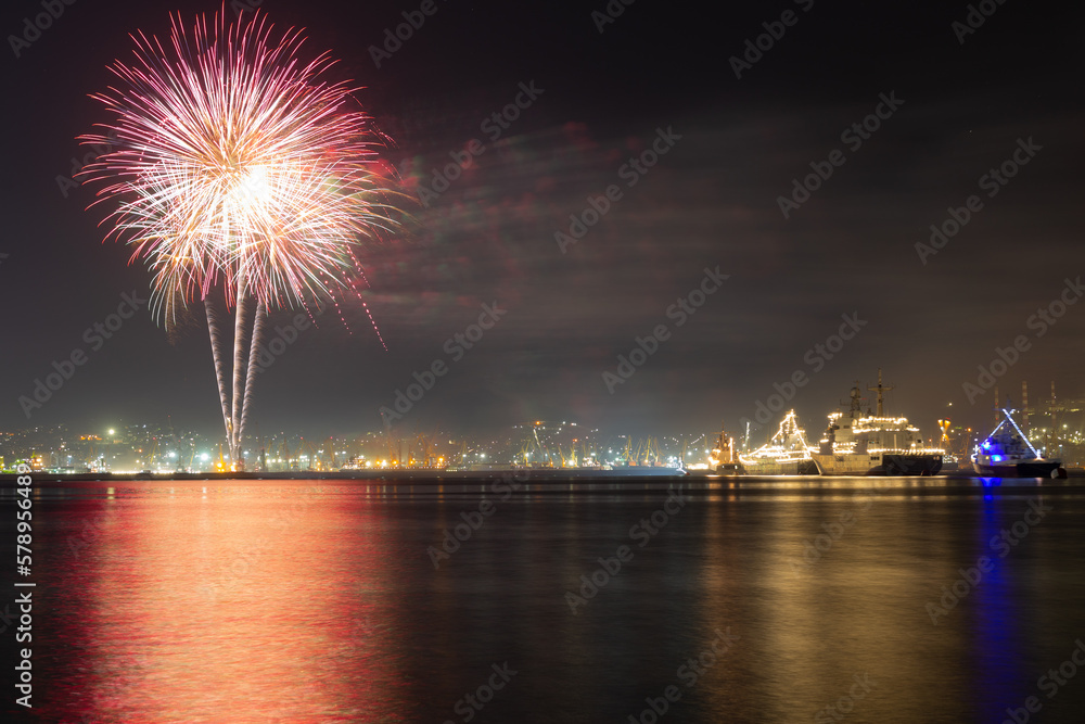 Fireworks on night city background. Novorossiysk. Russia. 31.07.2022