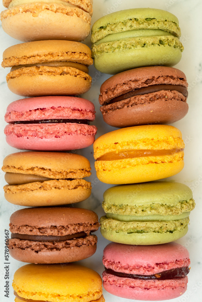 Above view of colorful macaroons on a marble background Above view of colorful macaroons on a marble background