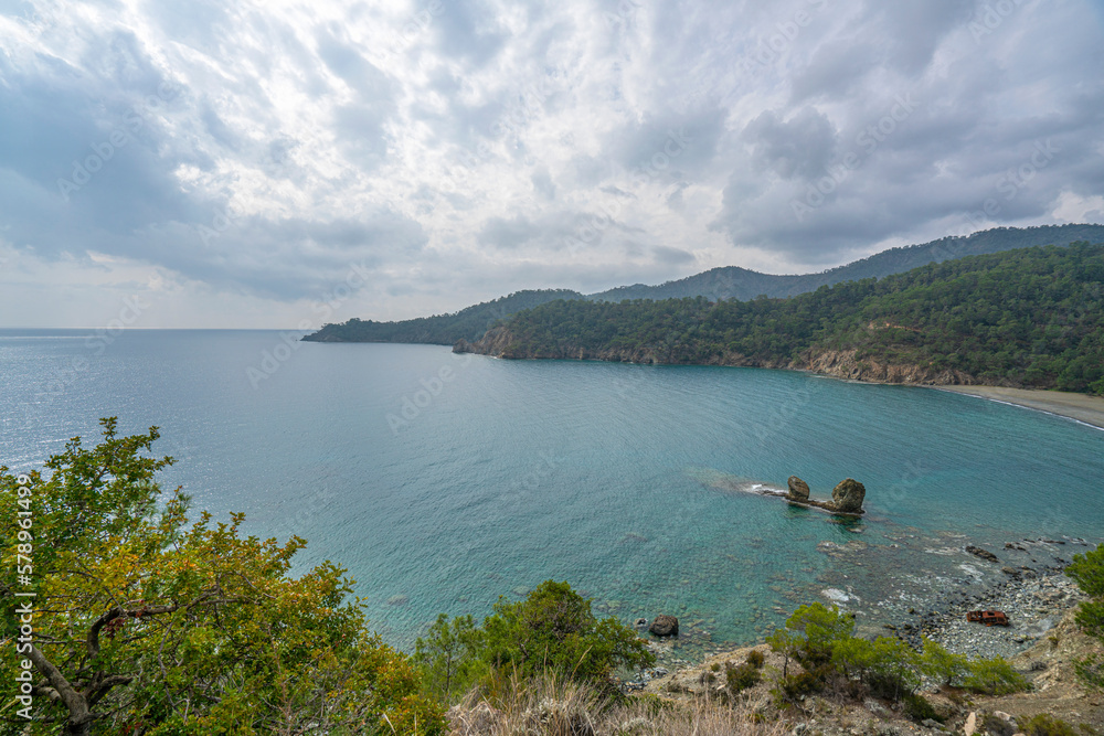 the scenic route of lycian trail, between Tekirova and Çıralı is full of amazing bays and beaches with forest and mountains.