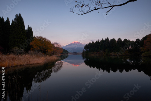 View of Mount Fuji at sunset from lake Tanuki, Shizuoka Prefecture photo