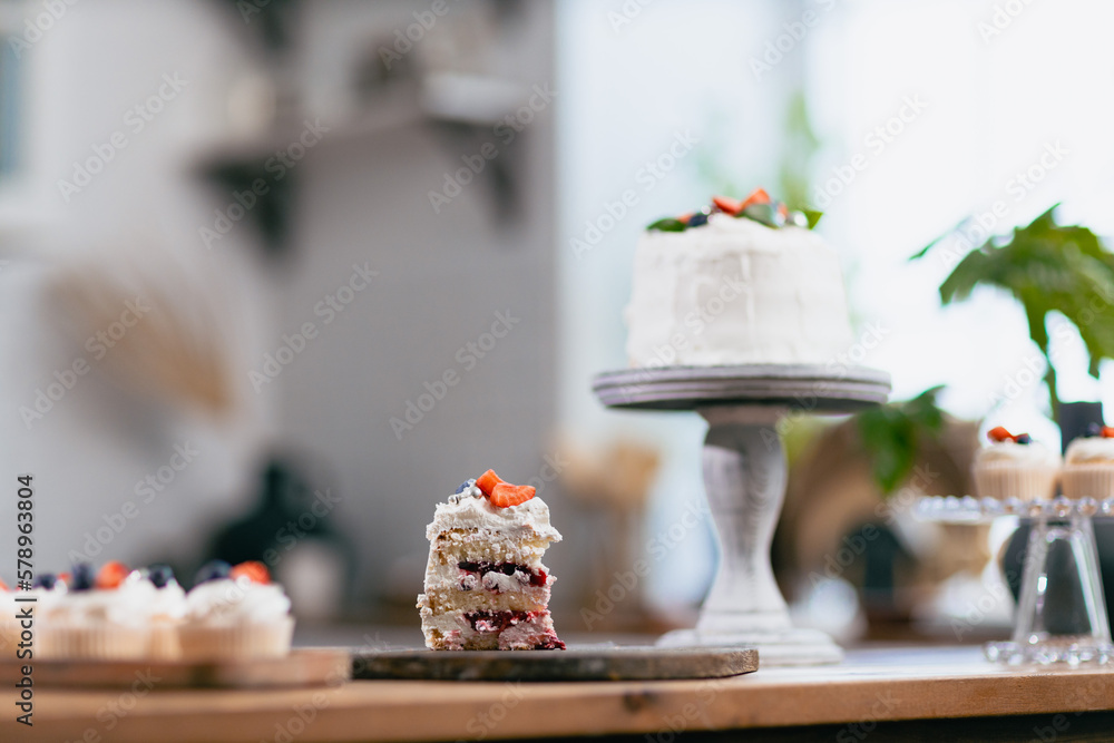Dessert cake on kitchen table. Cakes cupcakes and sweet dessert