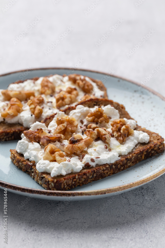 Sandwich with philadelphia and walnuts. Healthy nutritious paleo keto breakfast concept. Sandwich with philadelphia and walnuts. Healthy nutritious paleo keto breakfast concept.