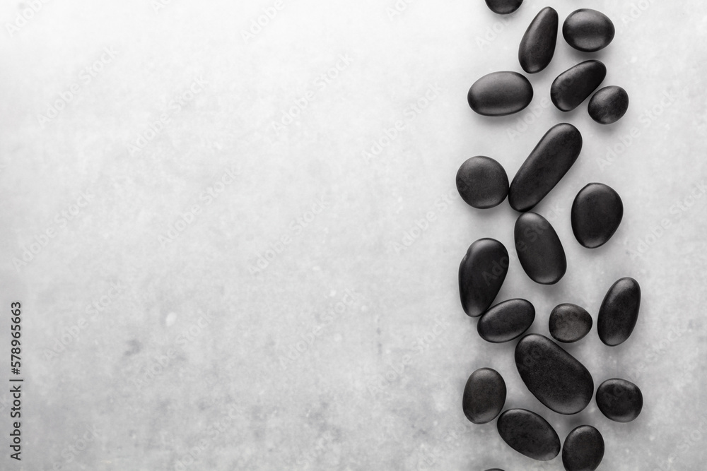 Spa massage stone theme on grey background. Spa massage stone theme on grey background.